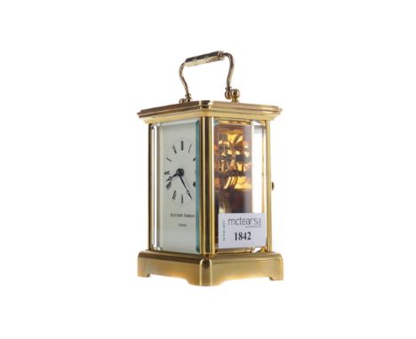 MID-20TH CENTURY CARRIAGE CLOCK, by Matthew Norman, with white enamel dial with Roman numerals and inscribed makers name, the