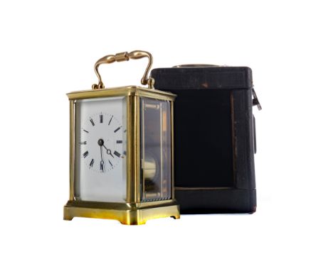 EARLY 20TH CENTURY CARRIAGE CLOCK, the two train eight day movement striking on a gong, with white enamel dial with Roman num
