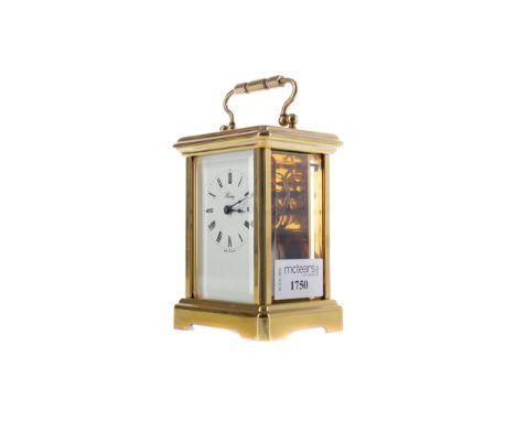 EARLY 20TH CENTURY CARRIAGE CLOCK, By Henley, with white enamel dial with Roman numerals and makers name, the brass five glas