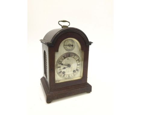 20TH CENTURY MAHOGANY BRACKET CLOCK, of George III design, with arched pediment over a silvered dial, inscribed D, Crichton, 