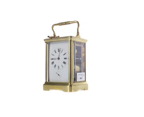 EARLY 20TH CENTURY REPEATER CARRIAGE CLOCK, the two train eight day movement striking on a gong, with white enamel dial with 