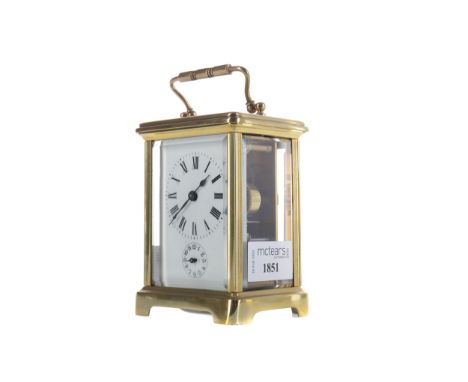 EARLY 20TH CENTURY CARRIAGE CLOCK, with white enamel dial with Roman numerals, subsidiary alarm dial, the alarm striking on a