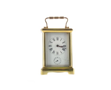 EARLY 20TH CENTURY CARRIAGE CLOCK, with white enamel dial with Roman numerals dial, subsidiary alarm dial, striking on a bell