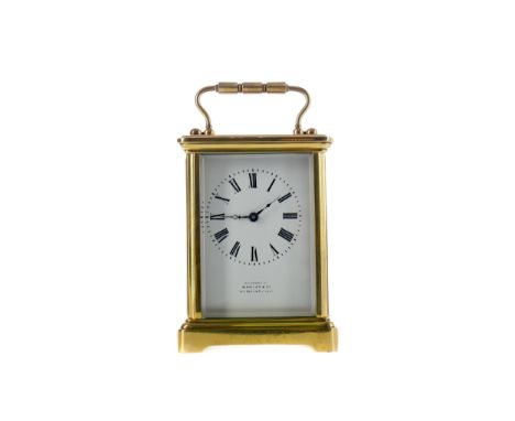 EARLY 20TH CENTURY CARRIAGE CLOCK, with white enamel dial with Roman numerals, inscribed 'Examined by Hawley &amp; Co. ...', 