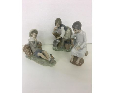 Three Lladro figures to include girl with dog and vase, and boy with birds