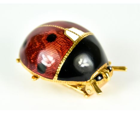 An 18ct Gold and Enamel Ladybird Brooch, Modern, with enamel on engine turned body, 28mm x 24mm gross weight 19.5g