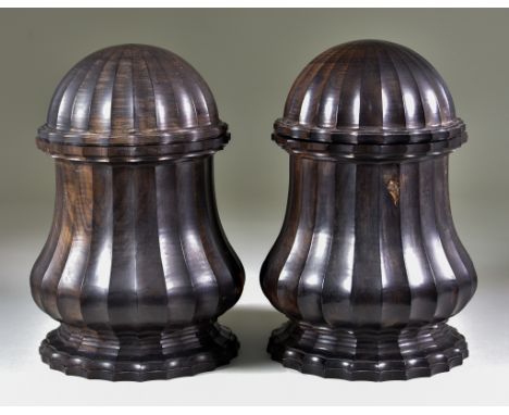 A Pair of Indian Hardwood Boxes and Covers, 19th/20th Century, with fluting to sides, and engine turning to bases, 8ins (20.3