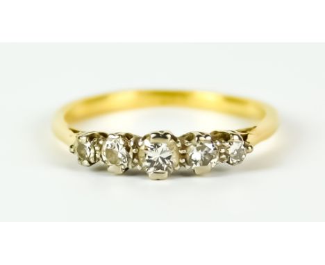 A Five Stone Diamond Ring, 20th Century, 18ct gold set with five small brilliant cut round diamonds, approximately .30ct tota