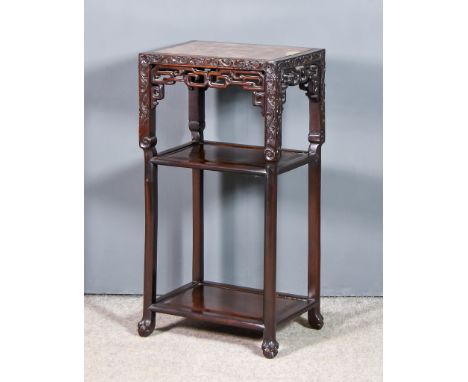 A Chinese Hardwood Rectangular Three Tier Occasional Table with Veined Marble Slab to Top, the frieze carved with leaf scroll