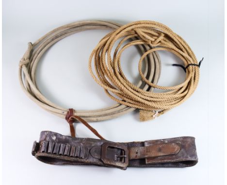 A U.S Leather .45 Calibre Cartridge Belt and Two Lariats, 19th Century, the belt being a barn find from Rochford, Wyoming, a 