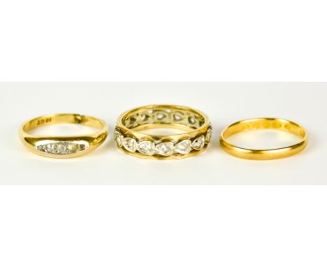 A 22ct Gold Wedding Band, and Two Gem Set Rings, the 22ct wedding band, size O, gross weight 2.1g, 18ct gold gem set engageme