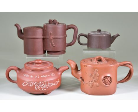 Four Chinese Yixing Stoneware Teapots and Covers, including double example, the two sections of circular outline, 4.25ins (10