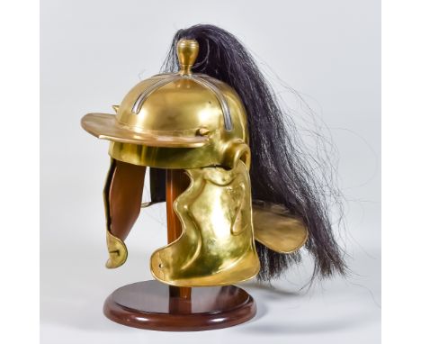A Full-Size Reproduction Brass Roman 'Centurion' Helmet, Modern, with horsehair plume Note: We are unable to post this lot. P