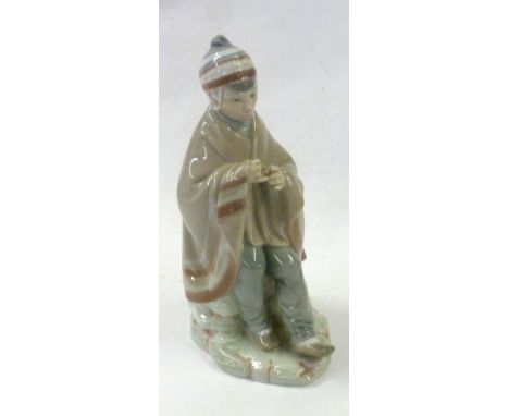 NAO FIGURE OF A LAPLAND BOY, 9 1/2" HIGH (one hand a.f.) 