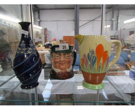 A Clarice Cliff jug a/f, a Doulton Lambeth vase a/f and a Royal Doulton character jug 'Mr Pickwick'