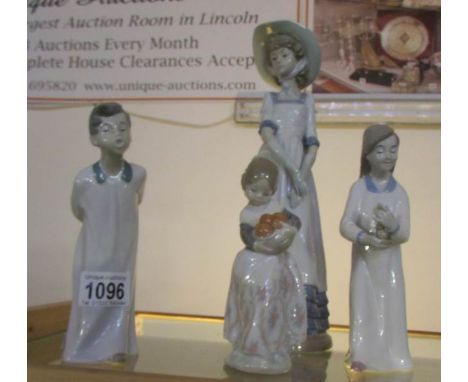 A LLadro figurine, a NAO figurine and 2 Scheidig figurines