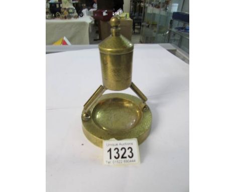 A circa 1890 brass table lighter, made in Switzerland