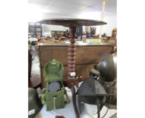 A mahogany tripod table with barley twist column