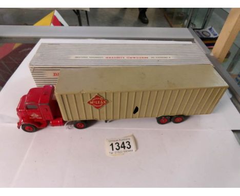 A Dinky 948 tractor trailer, Mclean, chipped trailer and missing rear doors, in original box