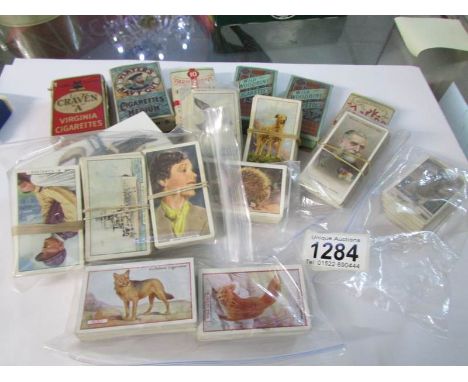 A quantity of cigarette cards including some sets