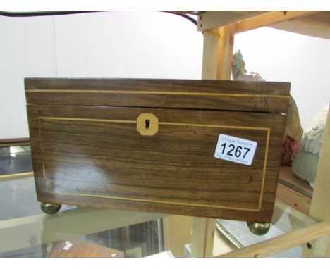 A 19th century inlaid tea caddy