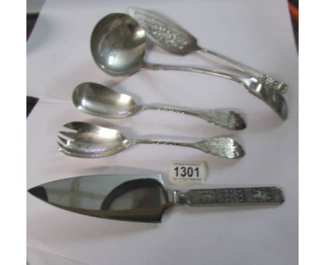 A silver plated soup ladle, a pair of silver plated salad servers and 2 silver plated cake slices