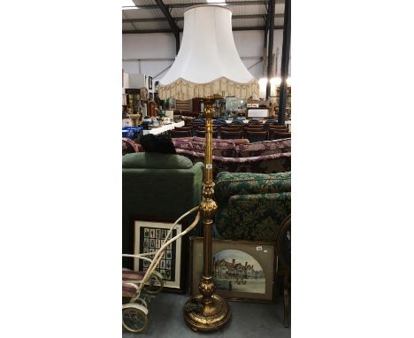A good 'Giltwood' standard lamp with shade