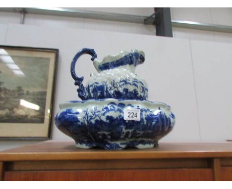 A blue and white Victoria ware Ironstone jug and basin set