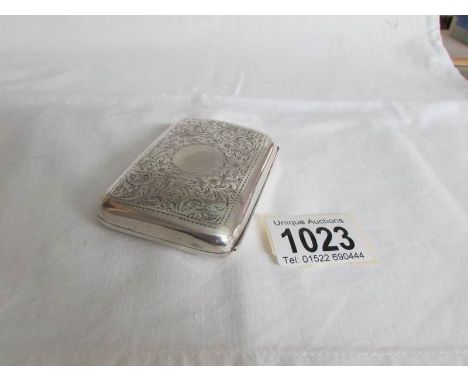 A silver cigarette case hall marked Birmingham 1922