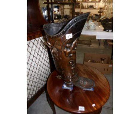 A boot shaped stick stand