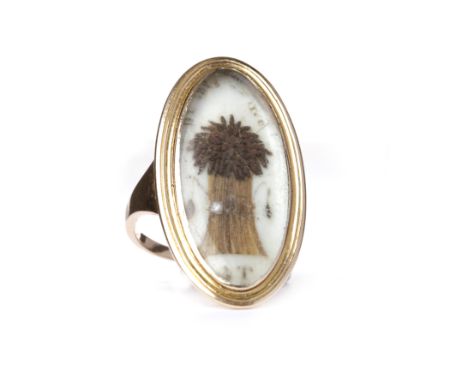 BONNIE PRINCE CHARLIE COMMEMORATIVE HAIRWORK RINGthe marquise shaped bezel 31mm long and with white plaque with hairwork imag