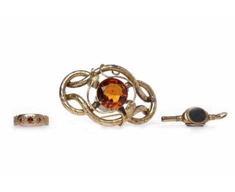 VICTORIAN CITRINE SET BROOCHopenwork and of knotted form, with scrollwork and engraving and foliate motifs, 51mm long, unmark