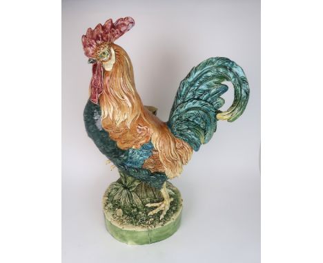 A LARGE CZECHOSLOVAKIAN POTTERY MODEL OF A COCKEREL with vase to back, with printed mark and impressed number 4686 to undersi