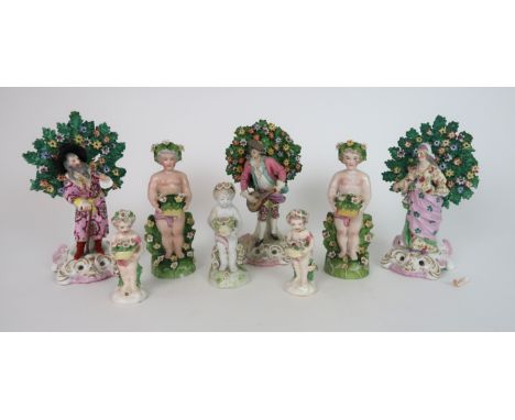 THREE 19TH CENTURY SAMSON PORCELAIN CHELSEA DERBY FIGURES each standing in front of a bocage, together with five assorted che