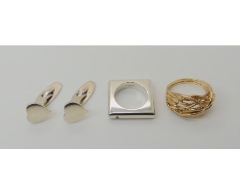 A PAIR OF DANISH SILVER CUFFLINKS in the shape of hearts made by Hans Hansen, a square silver ring set with a 0.02ct diamond,