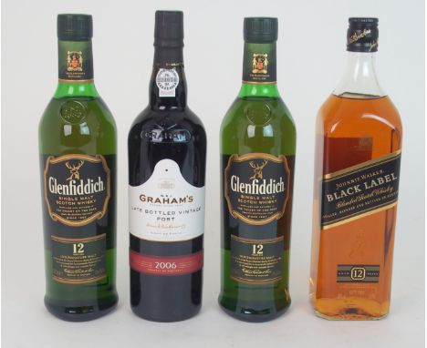 TWO BOTTLES OF GLENFIDDICH 12 YEAR OLD MALT WHISKEY A bottle of Johnnie Walker black label, a bottle of Old Smuggler, a bottl