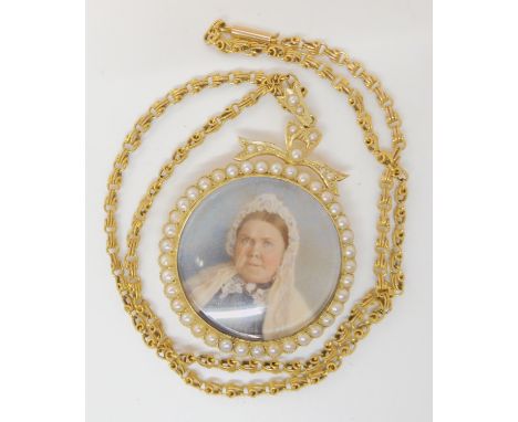 A 14CT GOLD PEARL SET PORTRAIT LOCKET with glazed panels to both sides, dimensions of the locket including bail 5.7cm x 4cm, 