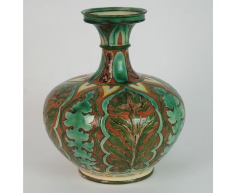 A DELLA ROBBIA POTTERY, BIRKENHEAD VASE of baluster shape with Persian style decoration, incised mark to base and HJ for Hann