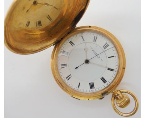 AN 18CT GOLD FULL HUNTER POCKET WATCH with white enamel dial, black roman numerals, silver coloured and blued steel hands the