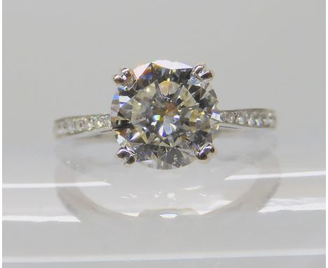 AN 18CT WHITE GOLD DIAMOND SOLITAIRE RING the main diamond is estimated approximately to be just over two carats, with dimens