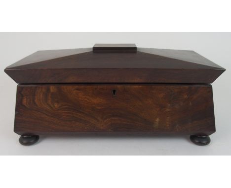 A LARGE SARCOPHAGUS ROSEWOOD TWO DIVISION TEA CADDY on bun feet, 40cm wide Condition Report: Available upon request