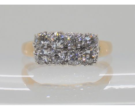 A DIAMOND PANEL RING set with eight old cut diamonds with an estimated combined total of 0.96cts, finger size P1/2, weight 3.