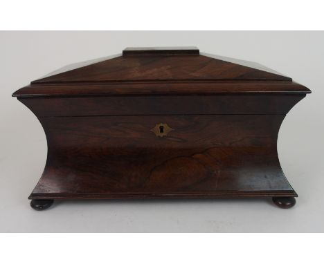 A LARGE SARCOPHAGUS ROSEWOOD TWO DIVISION TEA CADDY on bun feet, 36cm wide Condition Report: Available upon request