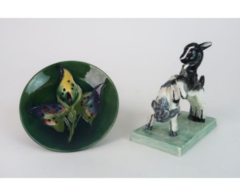 DORIS LINDNER FOR ROYAL WORCESTER - KIDS AT PLAY a group of two goat kids, no 3153, 10.5cm long, together with a Moorcroft Ar