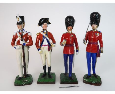 FOUR SITZENDORF MILITARY FIGURES including a Grenadier Guard, a Grenadier Guard Captain, an Officer of the Third Guards 1792 