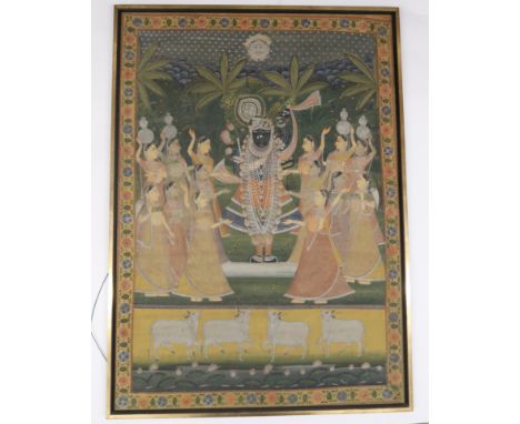 AN INDIAN PAINTED PANEL with dancing god surrounded by fourteen women dancing above four cattle and lily pads, watercolour on