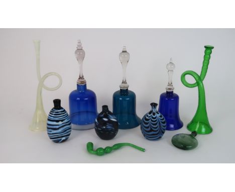 A COLLECTION OF NAILSEA GLASS including a green glass bell, two blue glass bells, three flasks with trailing decoration, two 