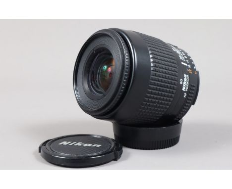 A Nikon AF Zoom Nikkor 35-80mm f/4-5.6D Lens, serial no 4003539, auto focus functions, barrel G, light wear, elements G, some