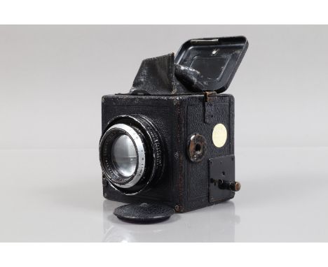 An Ernemann Ermanox Reflex SLR Plate Camera, circa 1926, 6 x 4.5cm format, body G, retailer's plate states AD FISCHL JR Fried