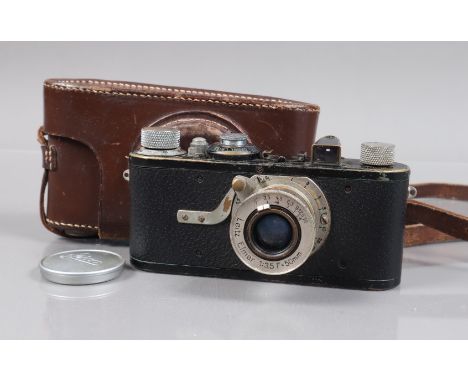 A Leitz Wetzlar Leica I Model A Camera, serial no 15066, 1929, body P-F, brassing, corrosion, signs of repainting, shutter fi